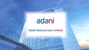 Gautam Adani speaking at a corporate event regarding infrastructure growth