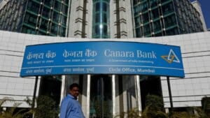 Canara Bank branding and financial growth charts for NRI investors