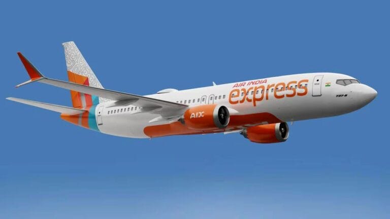 Air India Express aircraft parked at an international airport terminal