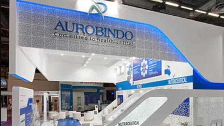 Aurobindo Pharma subsidiary office building with pharmaceutical regulatory compliance symbols