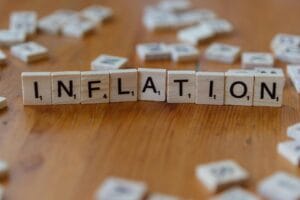 Financial analyst reviewing inflation charts and energy market data
