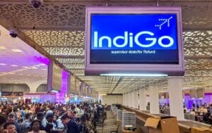 Indigo aircraft parked at an international airport terminal