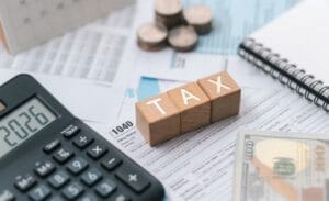 Legal gavel resting on financial documents representing the madras hc seeks tax petition