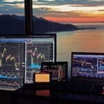 Professional financial analyst reviewing bitcoin market cycle charts on a digital screen
