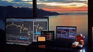 Professional financial analyst reviewing bitcoin market cycle charts on a digital screen