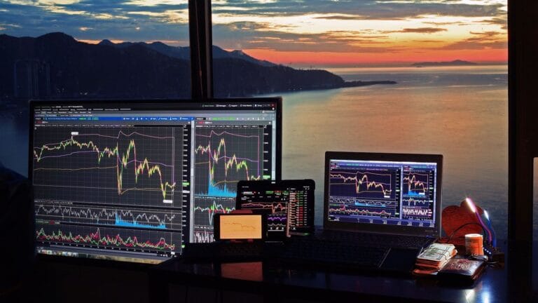 Professional financial analyst reviewing bitcoin market cycle charts on a digital screen