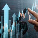 Digital charts showing the growth of ether and solana in a volatile market