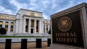 The Federal Reserve building representing the fed holds rates policy decision