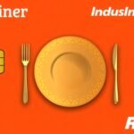 A person using the eazydiner, indusind bank credit card at a restaurant
