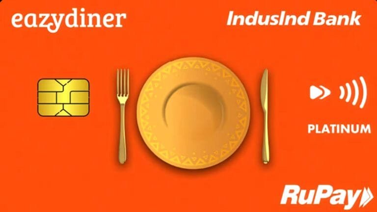 A person using the eazydiner, indusind bank credit card at a restaurant