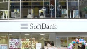 SoftBank logo and financial market data charts representing stock portfolio rebalancing