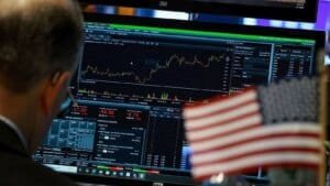 Stock market chart showing the nasdaq 100 index stabilizing after a period of volatility