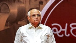 cm bhupendra patel addressing international investors at a business summit