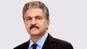 Anand Mahindra attending a professional business conference regarding economic policy