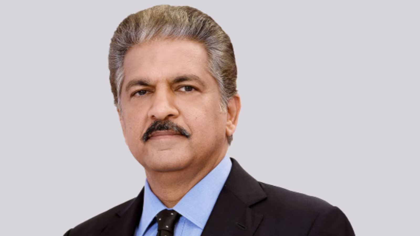 anand mahindra re-appointed: The Key Essential Update 1 Anand Mahindra attending a professional business conference regarding economic policy