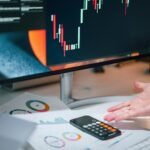 A professional trader analyzing crypto longs worth data on multiple monitors