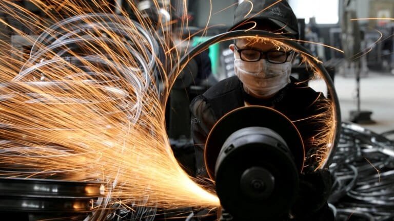 Industrial manufacturing facility representing India's growth in ten sectors where it competes with China
