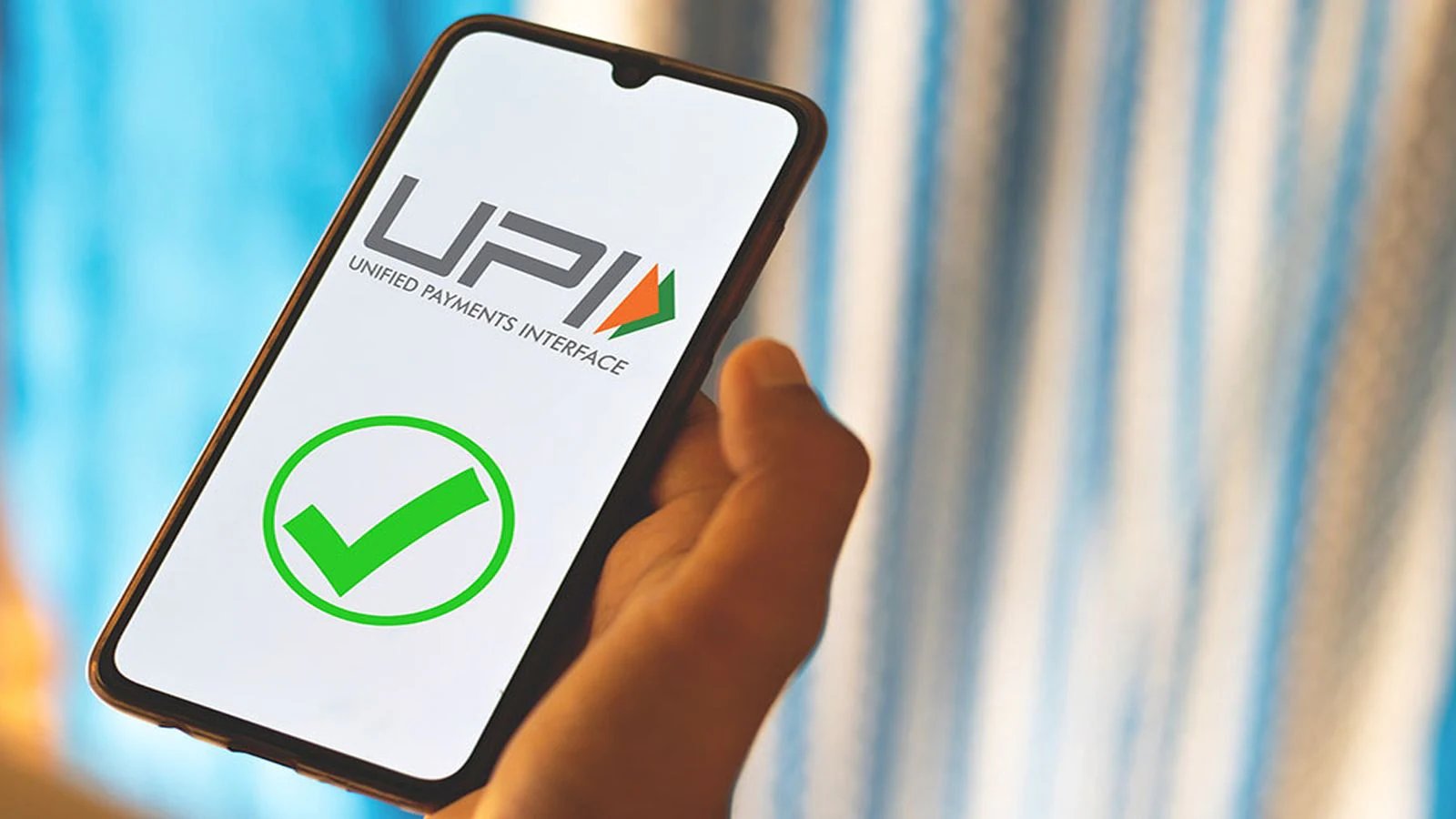upi mdr fee: The Essential Urgent Update for Merchants 1 Small business owner reviewing financial transaction data on a tablet